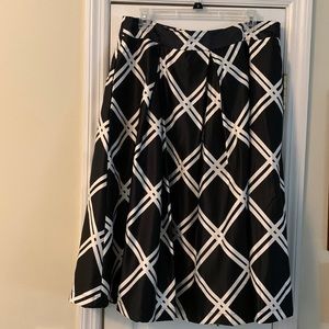 Be ready for a party with this Black and white skirt.